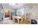 Eat in kitchen offers natural light, table, ceiling fan and plenty of space for seating at 14157 E 26Th Ave, Aurora, CO 80011