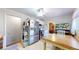 Well-equipped kitchen featuring stainless steel appliances, ample storage, and a cozy dining area at 14157 E 26Th Ave, Aurora, CO 80011