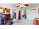 Open room that looks from kitchen and living room into a large living space at 14157 E 26Th Ave, Aurora, CO 80011