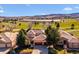 Beautiful home with a three car garage situated along the golf course with mountain views at 16611 Red Cliff Cir, Morrison, CO 80465
