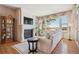 Inviting living room with a fireplace, large windows, and comfortable seating at 16611 Red Cliff Cir, Morrison, CO 80465