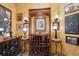Elaborate wine cellar featuring custom storage racks, ornate decor, and unique lighting at 16611 Red Cliff Cir, Morrison, CO 80465
