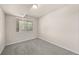 Cozy bedroom with a large window offering natural light at 9397 Las Ramblas Ct # D, Parker, CO 80134