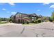 Beautiful townhome complex with professional landscaping and attached garages at 9397 Las Ramblas Ct # D, Parker, CO 80134