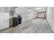Spacious two car garage with concrete floor and white drywall at 9397 Las Ramblas Ct # D, Parker, CO 80134