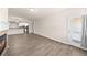 Spacious living room featuring hardwood floors, a fireplace, and access to the outdoor patio at 9397 Las Ramblas Ct # D, Parker, CO 80134