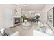 Bright, staged living room featuring a fireplace, modern decor, and open layout to the dining area and kitchen at 9397 Las Ramblas Ct # D, Parker, CO 80134