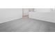 Spacious bedroom featuring neutral carpet and crisp white walls at 45910 Gentry Ave, Bennett, CO 80102
