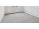 Bedroom with new carpeting and plenty of natural light from the window at 45910 Gentry Ave, Bennett, CO 80102