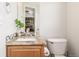 Small bathroom with granite countertop and updated vanity at 12035 Leyden St, Brighton, CO 80602