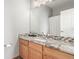 Bathroom with granite countertop and updated vanity at 12035 Leyden St, Brighton, CO 80602