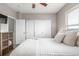 Bedroom with double closets and a view of the bathroom at 12035 Leyden St, Brighton, CO 80602