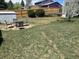 A spacious backyard featuring a patio set and privacy fencing at 3961 S Uravan St, Aurora, CO 80013
