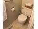 Cozy bathroom features a white toilet and a basket of neatly folded towels at 3961 S Uravan St, Aurora, CO 80013