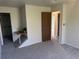 Bedroom featuring a walk-in closet and neutral carpet at 3961 S Uravan St, Aurora, CO 80013