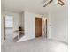 Neutral bedroom with access to closet and hallway at 3961 S Uravan St, Aurora, CO 80013