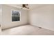 Bedroom featuring a carpeted floor and ceiling fan at 3961 S Uravan St, Aurora, CO 80013