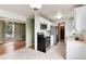 Open-concept kitchen with stainless steel appliances at 3961 S Uravan St, Aurora, CO 80013
