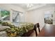 The main bedroom is bright and airy, leading to an outdoor patio at 5800 Tower Rd # 1201, Denver, CO 80249