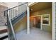 Outdoor patio with stairs, offering a private outdoor space perfect for relaxing or entertaining, easily accessible via sliding glass door at 5800 Tower Rd # 1201, Denver, CO 80249