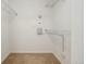 This walk-in closet has wire shelving with room for customization at 5800 Tower Rd # 1201, Denver, CO 80249