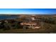 Stunning aerial view of the property with a lake and mature trees on a sprawling lot at 2102 Shoreside Dr, Berthoud, CO 80513