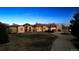 Aerial view of a luxurious single Gathering home with a circular driveway at 2102 Shoreside Dr, Berthoud, CO 80513