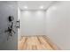 Vault room with combination safe door and wood floor at 2102 Shoreside Dr, Berthoud, CO 80513