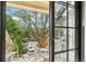 Welcoming balcony with street views, furnished with two chairs and a hanging lamp at 4876 E Kentucky Ave # F, Denver, CO 80246