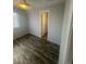 Comfortable bedroom with hardwood floors and neutral paint at 4876 E Kentucky Ave # F, Denver, CO 80246