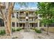 Charming two-story condo featuring lovely balconies and a well-maintained landscaped courtyard at 4876 E Kentucky Ave # F, Denver, CO 80246