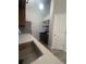 Well-lit kitchen featuring stainless steel appliances and wooden cabinets at 4876 E Kentucky Ave # F, Denver, CO 80246