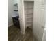 Pantry featuring several shelves for optimal storage at 4876 E Kentucky Ave # F, Denver, CO 80246