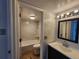 This modern bathroom has stylish tiles, updated fixtures, and a shower over the tub at 1020 15Th St # 25D, Denver, CO 80202
