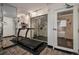 Bright gym featuring exercise machines and mirrored walls at 1020 15Th St # 25D, Denver, CO 80202