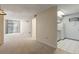 Spacious living room seamlessly connects to the kitchen, creating an open and inviting atmosphere at 1020 15Th St # 25D, Denver, CO 80202