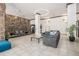 This stylish lobby area features comfortable seating, stone accents, and elegant lighting at 1020 15Th St # 25D, Denver, CO 80202