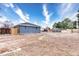 Spacious backyard with potential for landscaping, partially fenced with a mix of wood and metal at 11367 Fowler, Northglenn, CO 80233