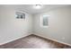 Cozy bedroom with gray walls, wood-look flooring, and white trim and doors at 11367 Fowler, Northglenn, CO 80233