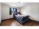 Comfortable bedroom with hardwood floors, neutral walls, and natural light at 11367 Fowler, Northglenn, CO 80233