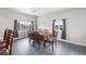Sunlit dining room featuring new flooring, neutral walls, and modern windows at 11367 Fowler, Northglenn, CO 80233
