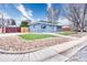 Charming single-story home with blue brick and a well-maintained, low maintenance rock and grass yard at 11367 Fowler, Northglenn, CO 80233