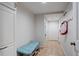 Inviting entryway with a convenient bench, tiled floor, and coat rack for organized storage at 10226 E Fair Pl, Englewood, CO 80111