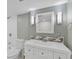 Bathroom featuring a white vanity, a white toilet, and a shower with white subway tile at 55 Two Moon Rd, Idaho Springs, CO 80452