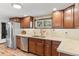 Kitchen with granite countertops, stainless steel appliances, and warm wood cabinetry at 55 Two Moon Rd, Idaho Springs, CO 80452