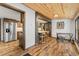 Open-concept kitchen with stainless steel appliances and warm wood accents at 55 Two Moon Rd, Idaho Springs, CO 80452
