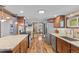 Spacious kitchen featuring granite countertops, wood cabinets, and stainless steel appliances at 55 Two Moon Rd, Idaho Springs, CO 80452