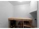 Unfinished basement workshop area with storage space and work bench at 1245 Garfield St, Denver, CO 80206