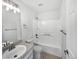 Spacious bathroom with a tub and shower combination at 10020 Strathfield Ln, Highlands Ranch, CO 80126