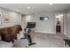 Open bonus room featuring neutral carpet, recessed lights and open layout perfect for multiple uses at 14823 W 70Th Dr # A, Arvada, CO 80007